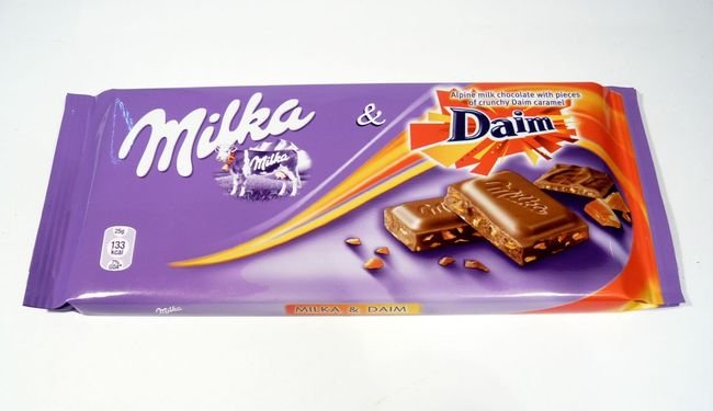 Box - Germany - KRAFT Milka Daim (Chopped Toffee Chunks) 100g x 22 units - SugarMarket.ca