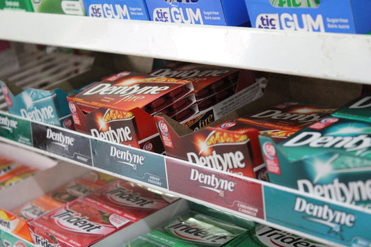 kitkat chocolate bar on white shelf
