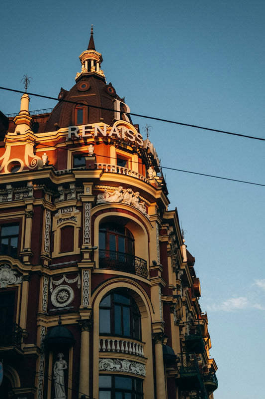 brown concrete building under blue sky during daytime