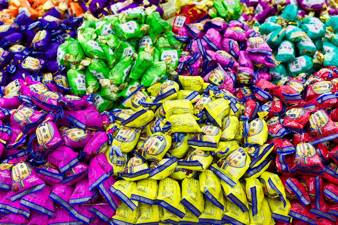 A large pile of colorful candies sitting on top of a table