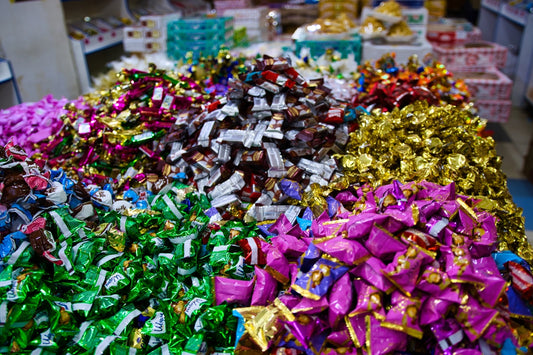 Colorful assortment of wrapped candies in bulk