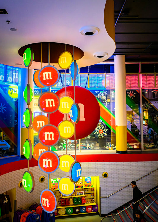 Colorful m&m's display hanging from ceiling